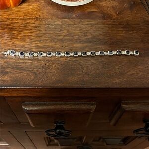 Sterling Silver (stamped) with blue & simulated diamond stones.